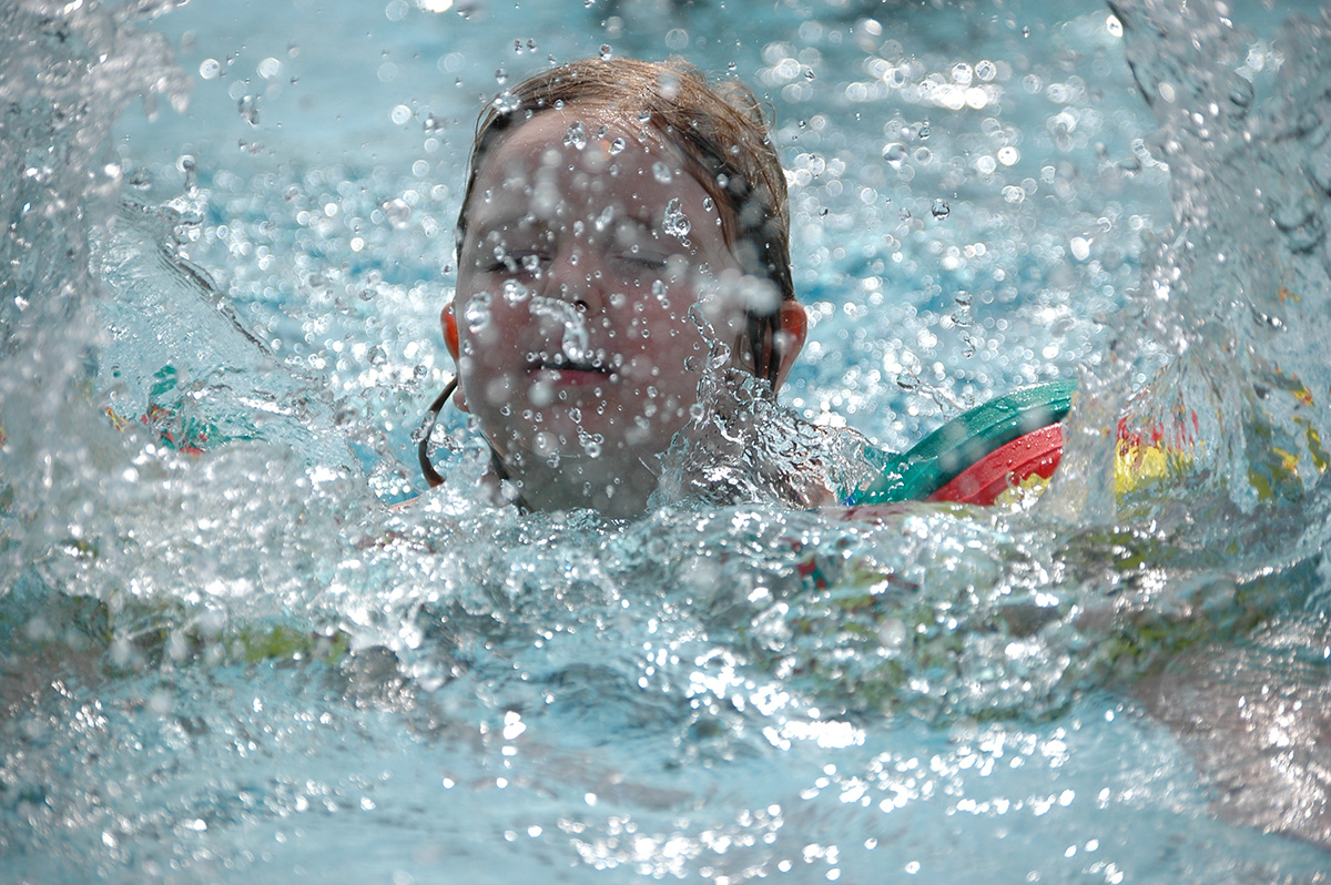 young girl in pool