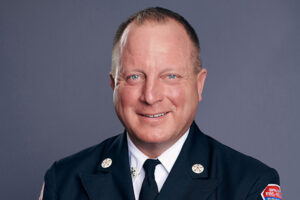 Chief John Schneider