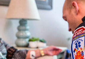 Firefighter-Paramedic providing care