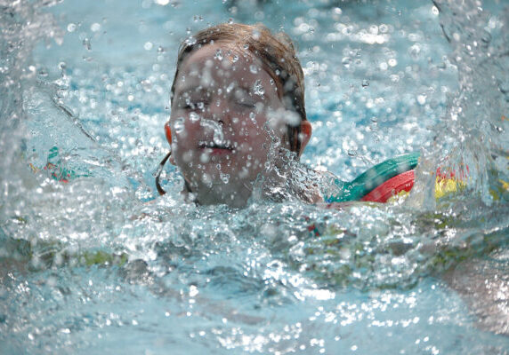 young girl in pool
